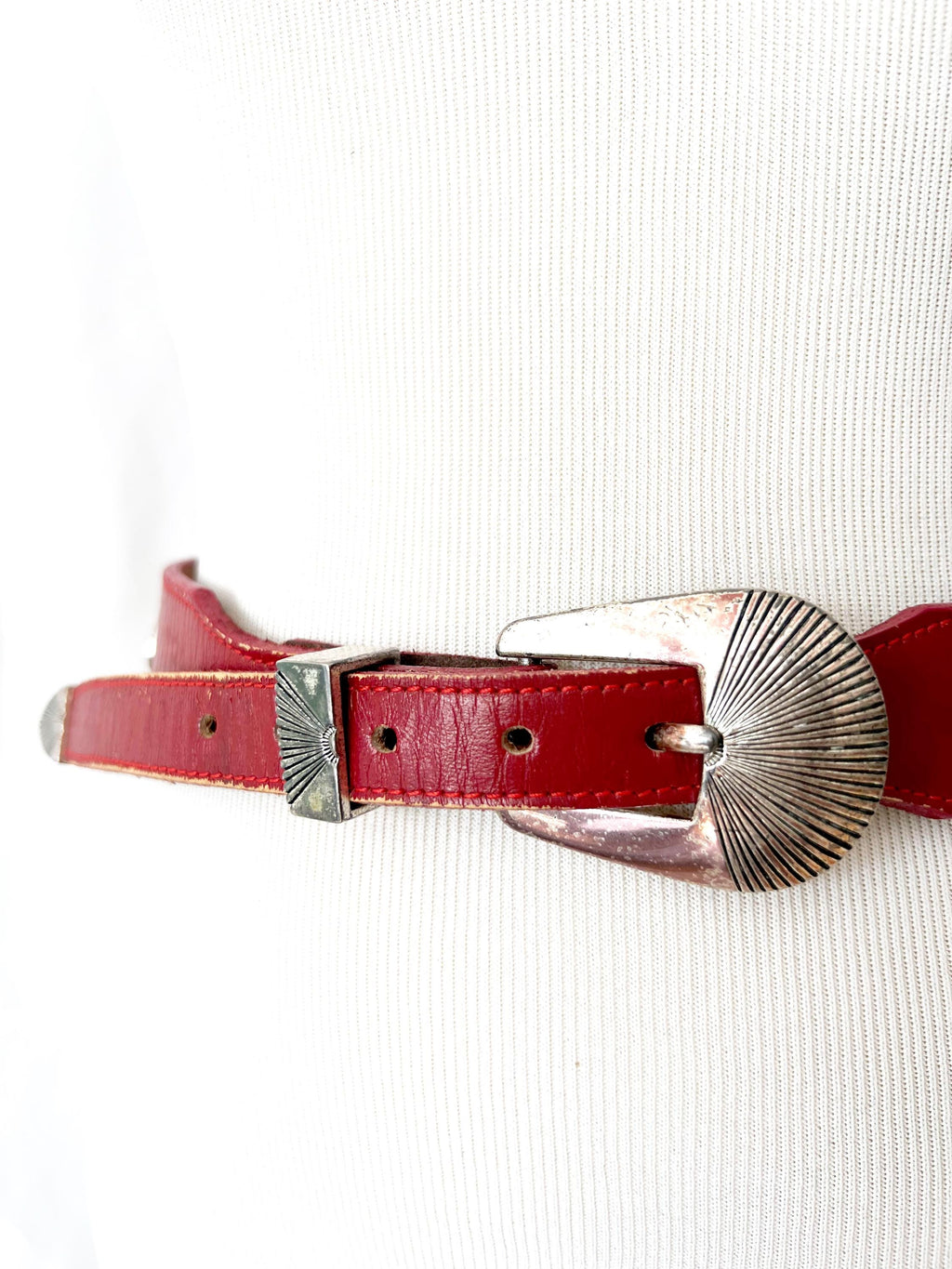 red leather belt with silvertone animals figures  xs