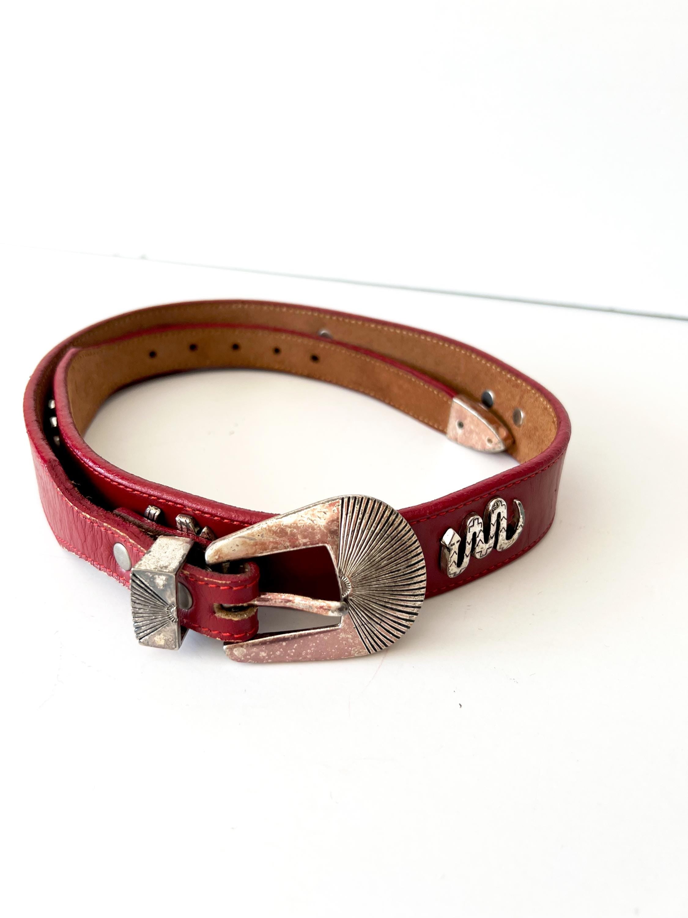 red leather belt with silvertone animals figures  xs
