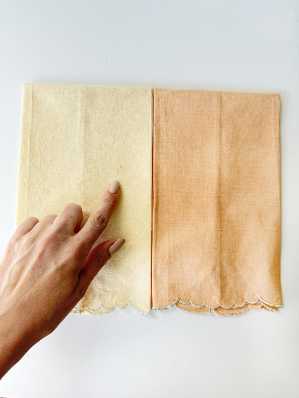 pair of fingertip towels floral embroidered pale yellow and peachy orange