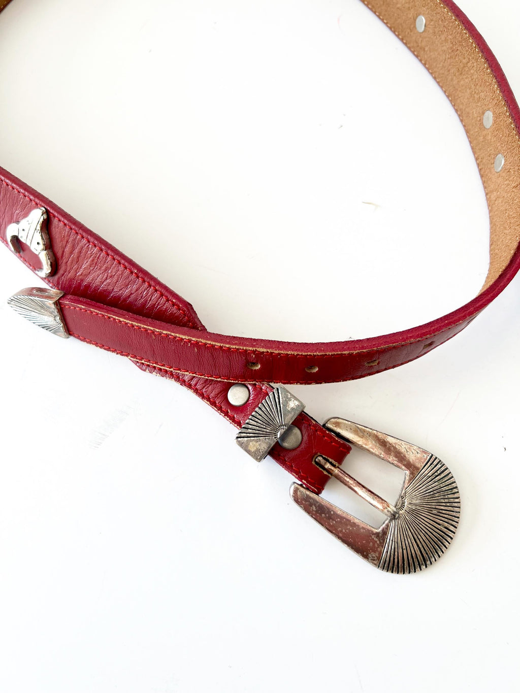 red leather belt with silvertone animals figures  xs