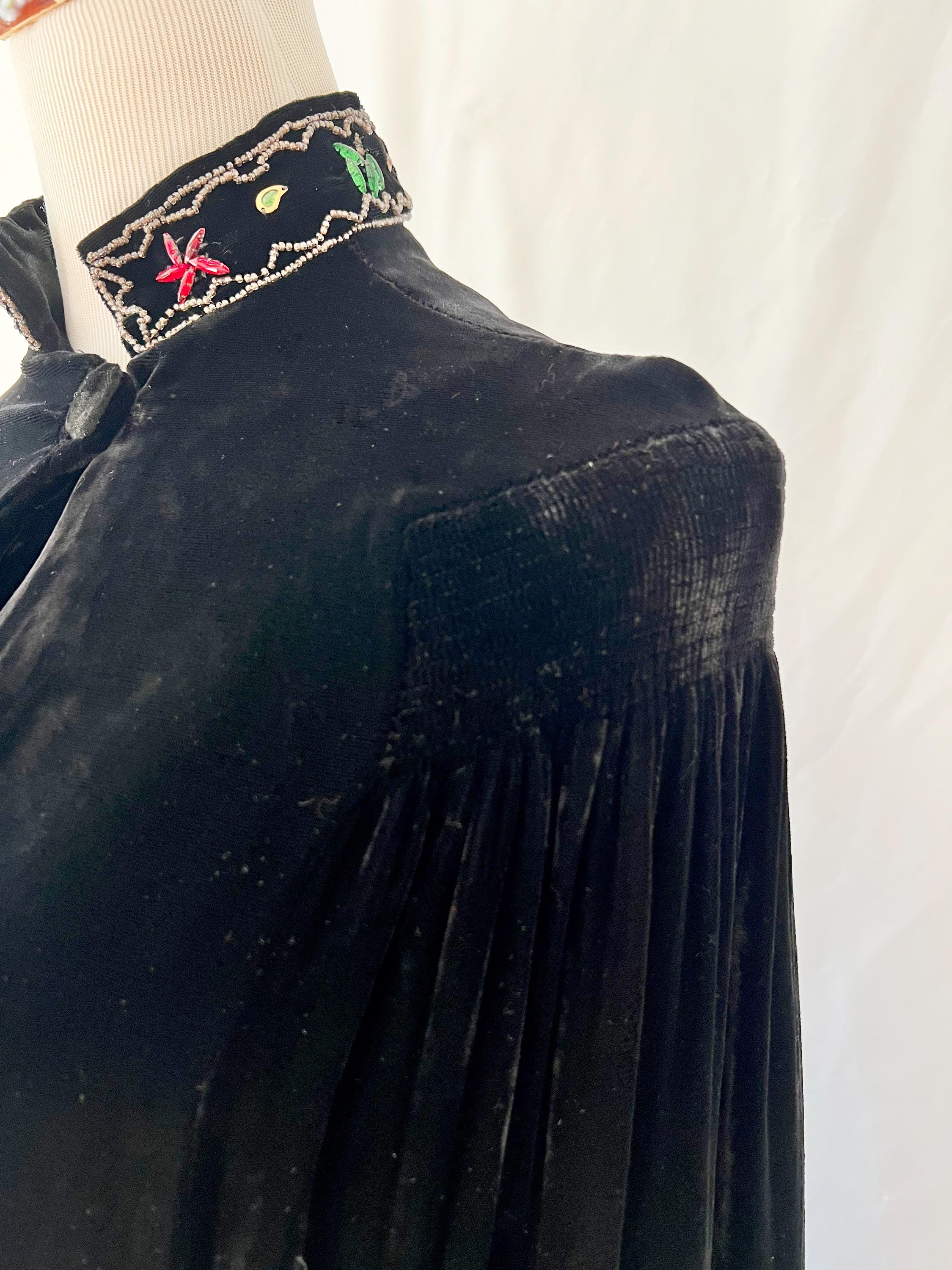 jeweled black velvet cape
