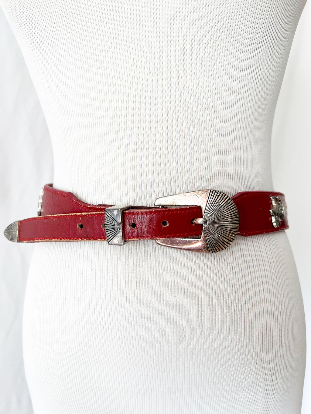 red leather belt with silvertone animals figures  xs